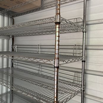 StorageMart - This corner of the shelving unit was directly under the hole in the roof. - Self Storage Near Me - Kansas City, Missouri StorageMart - This corner of the shelving unit was directly under the hole in the roof. - Self Storage Near Me - Kansas City, Missouri