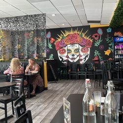 Cocina y Cantina Mexican Grill - Picture sugar skull mural inside inside the restaurant.