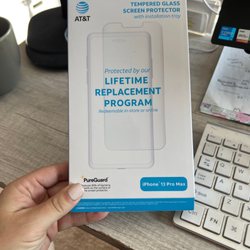 AT&T Store - Don't buy the "lifetime replacement program" screen protector if offered. It's a scam.