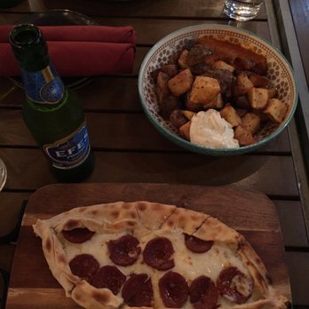 ala - Efes Pilsen, Patates and Sucuklu Pide in this photo. - Mediterranean Near Me - Washington, DC, District of Columbia ala - Efes Pilsen, Patates and Sucuklu Pide in this photo. - Mediterranean Near Me - Washington, DC, District of Columbia