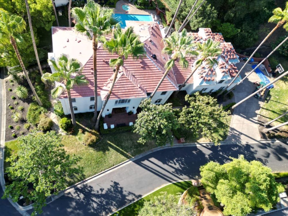 Slide of RR Alvarez Roofing