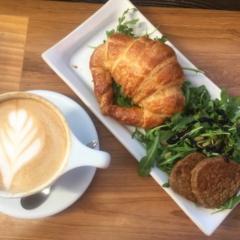 Lofty Coffee - mocha + coconut milk, gruyere and fig croissant and a side of plant-based sausages - Coffee & Tea Near Me - San Diego, California Lofty Coffee - mocha + coconut milk, gruyere and fig croissant and a side of plant-based sausages - Coffee & Tea Near Me - San Diego, California