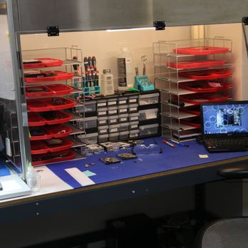 Data Recovery Man - Cleanbench. Drive transplant surgery is performed in this purified air unit. - Data Recovery Near Me - Santa Ana, California