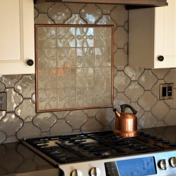 Susan Hershman - Studio One Design - Copper liner frames contrasting graphic tile with the same color. - Interior Design Near Me - Oakland, California Susan Hershman - Studio One Design - Copper liner frames contrasting graphic tile with the same color. - Interior Design Near Me - Oakland, California