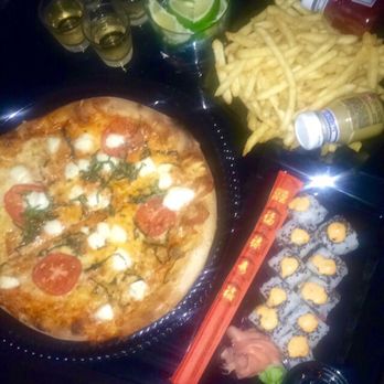 E11EVEN - Margherita pizza, spicy tuna roll, fries - Dance Clubs Near Me - Miami, Florida