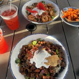 Creek Bowl with Grilled Shrimp (top), Creek Bowl with Brisket (bottom), flavored lemonades (left), sweet potato fries (right) Creek Bowl with Grilled Shrimp (top), Creek Bowl with Brisket (bottom), flavored lemonades (left), sweet potato fries (right)