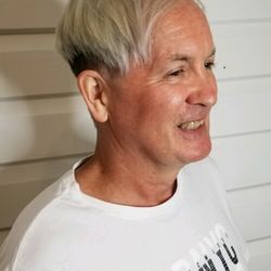 Angela's Pure Salon & Spa - New edgy style, undercut with platinum color.  Love it !!!