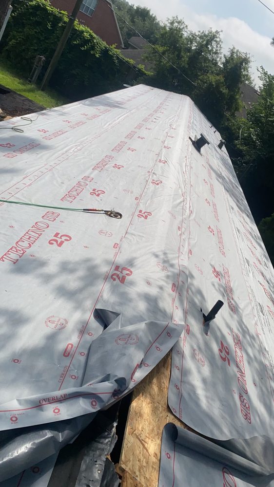 Slide of Vincents Roofing