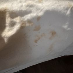 Woodridge Inn and Suites - Stained sheets.