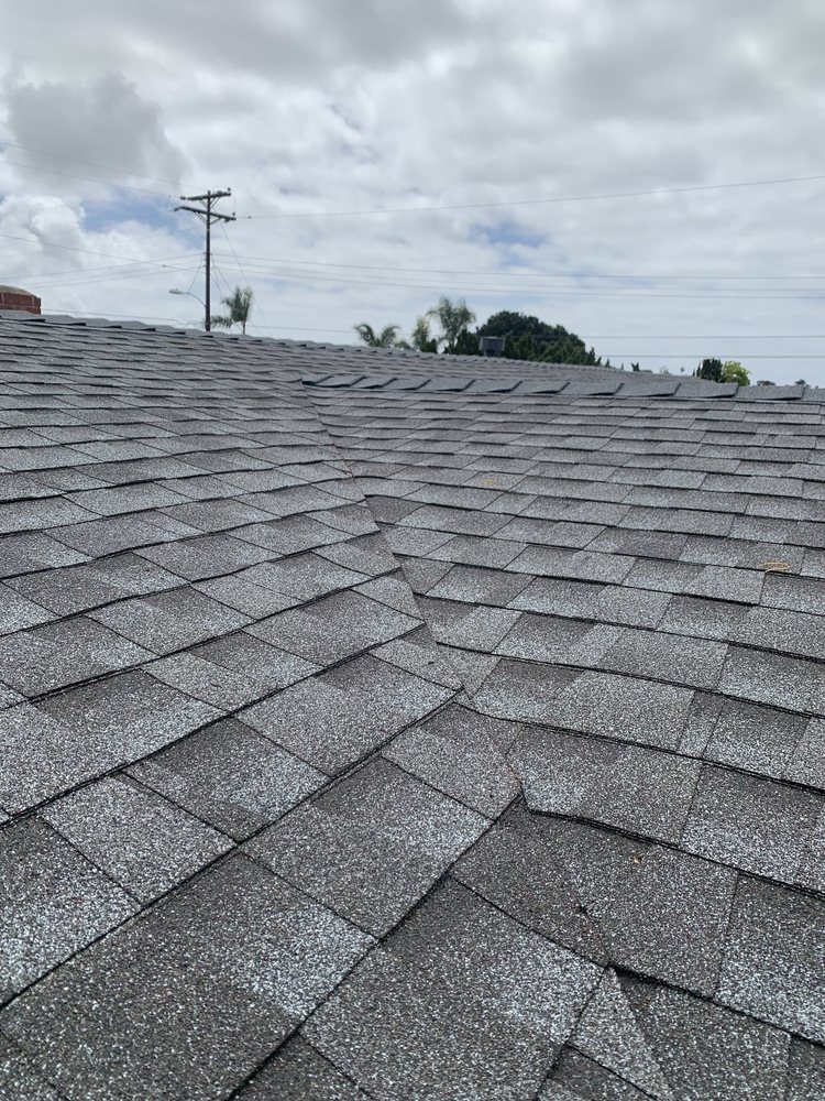 Slide of Mo's Professional Roofing