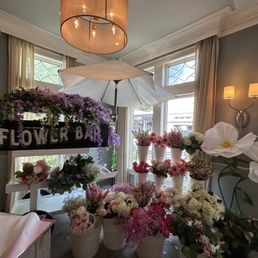 Flower bar with tons of flowers for 50+ person bridal shower
