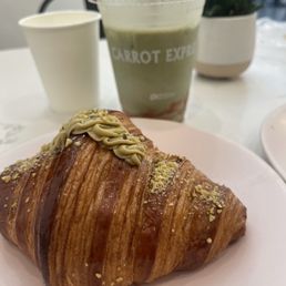 Pistachio croissant & oat-milk strawberry matcha Pistachio croissant & oat-milk strawberry matcha