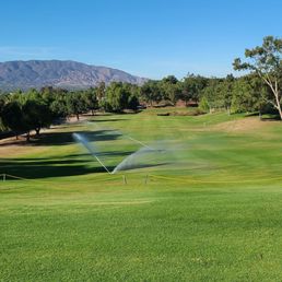 Sprinklers on at almost every fairway
