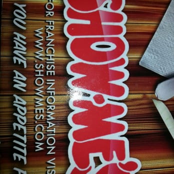 Show Me's - a pair of scissors next to a sign - Seafood Near Me - Terre Haute, Indiana Show Me's - a pair of scissors next to a sign - Seafood Near Me - Terre Haute, Indiana