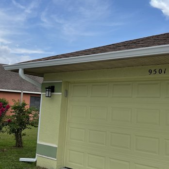Gutter Solutions - Clean white gutters that go all around the house....as they should. - Gutter Services Near Me - Bradenton, Florida