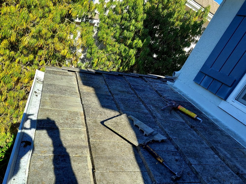 Slide of Huertas roofing