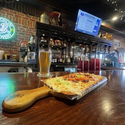 U Pick 6 Harbor House - Harbor House's signature white sauce Carbonara pizza with an ipa