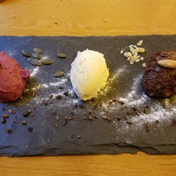 Stübers Restaurant - Desert served on slate. The one in the middle is Reisling ice...