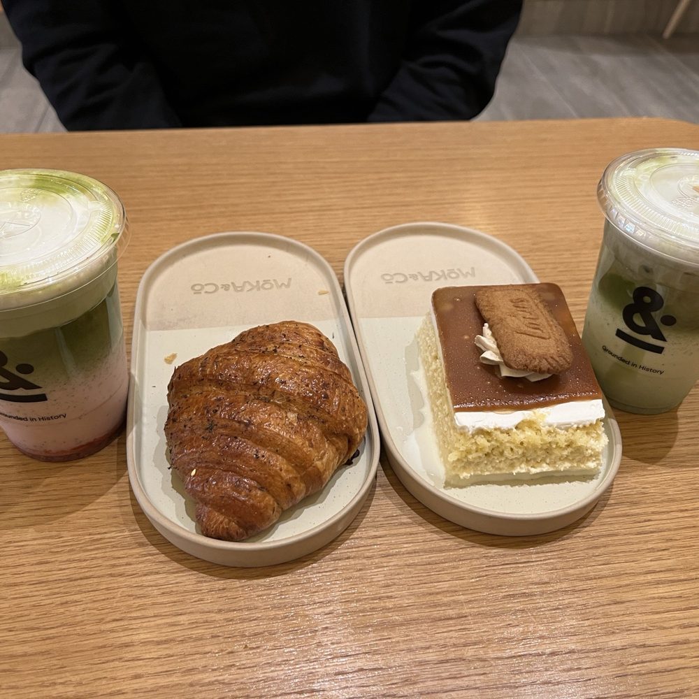 Moka & Co - Strawberry and pistachio matcha lattes, zatar cheese croissant, Biscoff milk cake - Coffee & Tea Near Me - Manhattan, New York Moka & Co - Strawberry and pistachio matcha lattes, zatar cheese croissant, Biscoff milk cake - Coffee & Tea Near Me - Manhattan, New York
