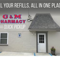 G & M Pharmacy - Exterior of Quick Pickup with reserved customer parking.