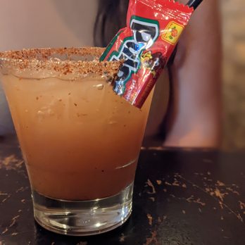 La Mejikana - a drink with a candy bar sticking out of it - Mexican Near Me - Chicago, Illinois