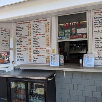 Cobie's - a food stand with menus on it - Fish & Chips Near Me - Brewster, Massachusetts