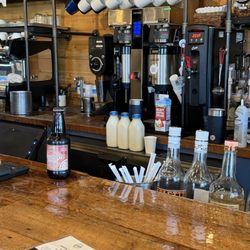 Craft Coffee House - Coffee bar set up. They roast their own beans and blends! Notice the milk bottles?