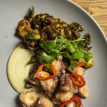 Palenque Kitchen - Pulpo
Crispy octopus, mint jalapeno aioli, brussel sprouts, macadamia nuts,piloncillo glaze, garnished fresno jalapeño peppers - Mexican Near Me - Riverside, California Palenque Kitchen - Pulpo
Crispy octopus, mint jalapeno aioli, brussel sprouts, macadamia nuts,piloncillo glaze, garnished fresno jalapeño peppers - Mexican Near Me - Riverside, California