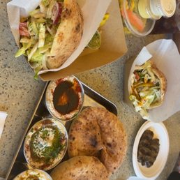 Chicken Falafel Sandwich, beef Chicken Shawarma Sandwich, Dip Trip, lamb kofta & torshi Chicken Falafel Sandwich, beef Chicken Shawarma Sandwich, Dip Trip, lamb kofta & torshi