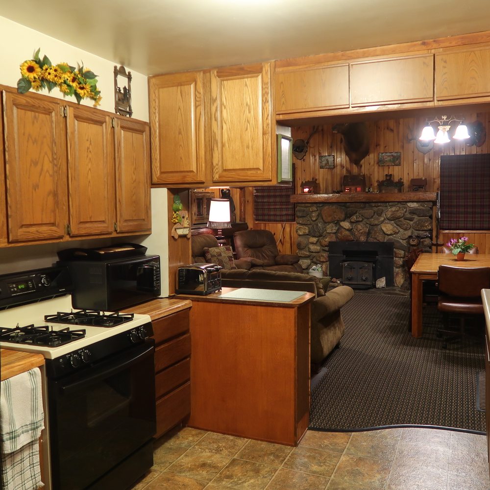 Camp Custer Log Cabins - Skyview Kitchen into Dining and Livingroom. I cannot emphasize enough how STOCKED this kitchen is - you won't want for anything. - Vacation Rentals Near Me - Custer, South Dakota Camp Custer Log Cabins - Skyview Kitchen into Dining and Livingroom. I cannot emphasize enough how STOCKED this kitchen is - you won't want for anything. - Vacation Rentals Near Me - Custer, South Dakota