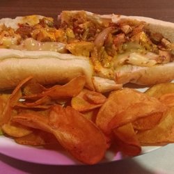 Batter's Box Sports Bar & Grille - Papi's chicken cheese steak with house-made potato chips.