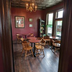 Workers Tap & Cafe - Back room with five two-seater tables and a restroom