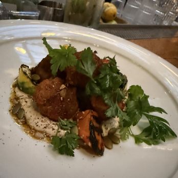 The Grey - Fritters with tahini and veggies - New American Near Me - Savannah, Georgia The Grey - Fritters with tahini and veggies - New American Near Me - Savannah, Georgia