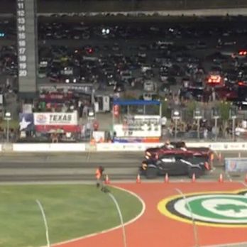 Texas Motor Speedway - Two pickups racing. You can see the smoke from the tires. They haul! - Race Tracks Near Me - Fort Worth, Texas