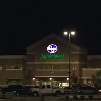 Kroger - the front of a grocery store at night - Grocery Near Me - Burleson, Texas