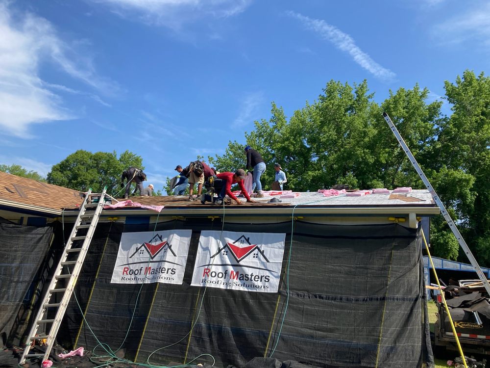 Slide of Roof Masters Roofing Solutions