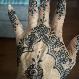 Henna tattoo with black ink Henna tattoo with black ink