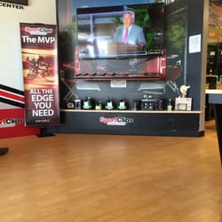 Robert Kraft on the TV. Clean shop. I've been coming here for five years now.