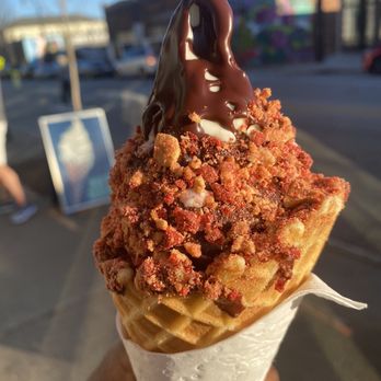 Big Softie - Vanilla ice cream on waffle cone dipped in dark chocolate hard shell with pink almonds - Ice Cream & Frozen Yogurt Near Me - Atlanta, Georgia