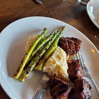 Bluefish River Tavern - Baked haddock with risotto and grilled asparagus and steak tips with mashed potatoes and grilled asparagus. - Seafood Near Me - Duxbury, Massachusetts Bluefish River Tavern - Baked haddock with risotto and grilled asparagus and steak tips with mashed potatoes and grilled asparagus. - Seafood Near Me - Duxbury, Massachusetts