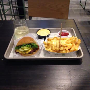 Shake Shack Flatbush - Barclays Ctr - Single patty burger with cheese fries and an extra side if their delicious cheese - Burgers Near Me - Brooklyn, New York
