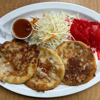 La Catracha - Pupusas w/ homemade refried beans and cheese ($10) - Latin American Near Me - Charlotte, North Carolina La Catracha - Pupusas w/ homemade refried beans and cheese ($10) - Latin American Near Me - Charlotte, North Carolina