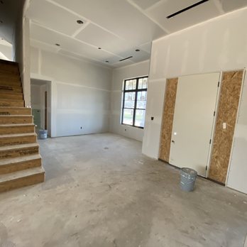Nationwide Frame & Drywall - unfinished living room - Drywall Installation & Repair Near Me