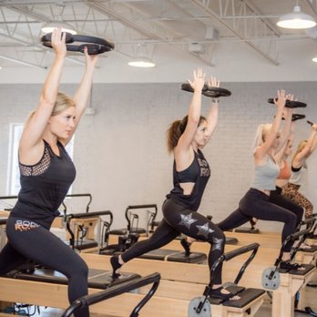 Body Rock Pilates - Working the Pilates ring - Pilates Near Me - Houston, Texas