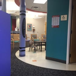 Nimmo Pediatrics - Waiting area, tv's with Pixar movies are super helpful.