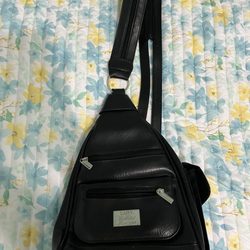 May Shoe Repair & Dry Cleaners - Leather backpack purse that was repaired.