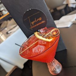 Topclass Jamaican Bar & Grill - Run with a Punch