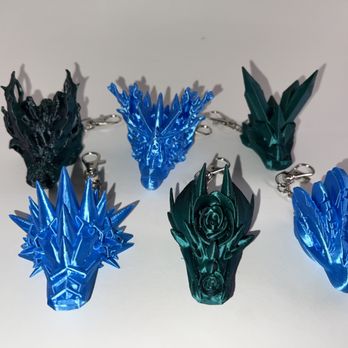 Slice Dice and Print-3D printing - Dragon head keychains - 3D Printing Near Me Slice Dice and Print-3D printing - Dragon head keychains - 3D Printing Near Me