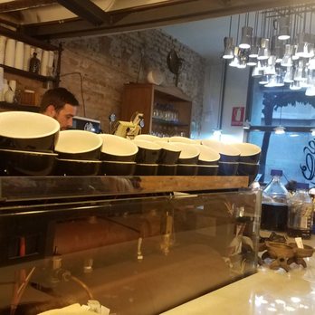 CafeLab - Those up there in the ceiling are Bialetti coffee makers :) awesome - Desserts Near Me - Murcia, MU