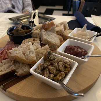 VIM Dining & Desserts - Seasonal bread and butter board with liver mouse, jam, candied pistachios, and tasty, savory mushrooms, olives, cured meat, and bread. - New American Near Me - Santa Cruz, California